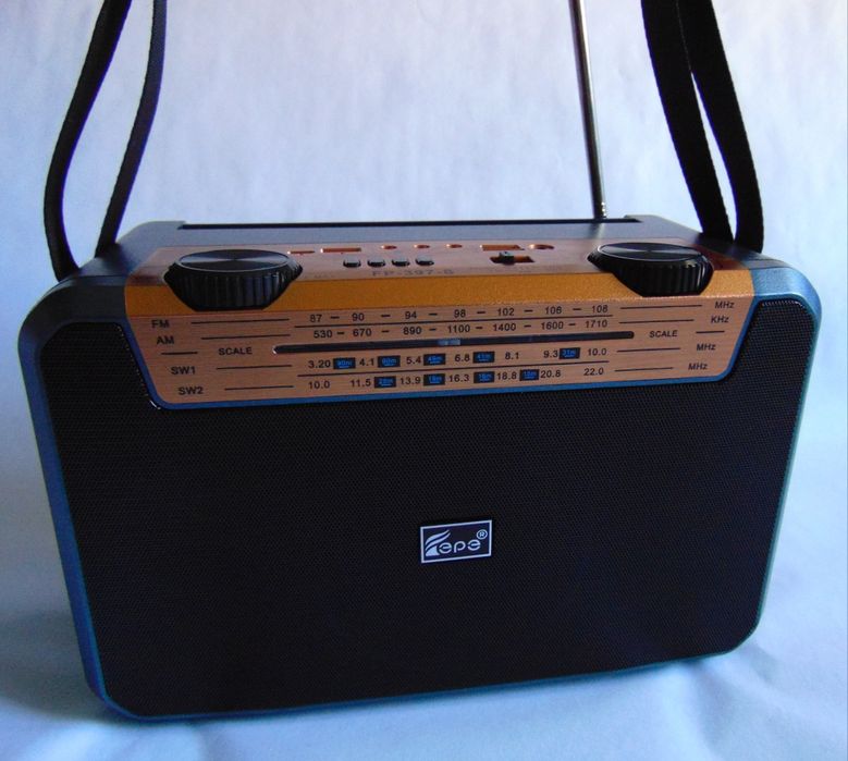 Aparat radio powerbank cu redare muzica prin  bluetooth . Usb  și card microSD
