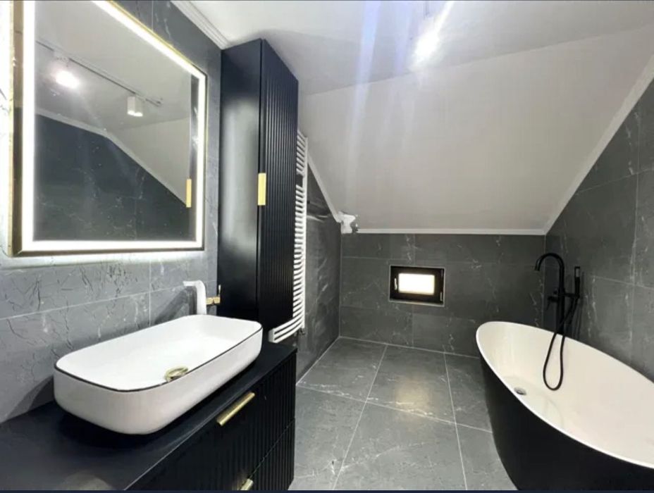 Casă modernă P+M de vânzare în Gura Humorului – finisaje premium, teren 300 mp