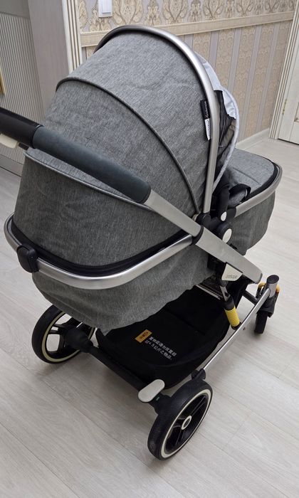 Коляска Una-Baby