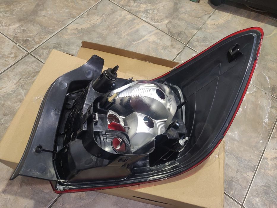 Фонарь задний левый Logan