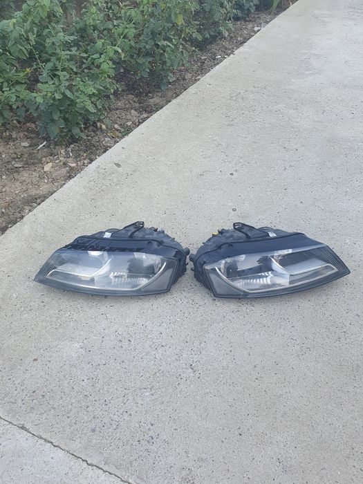 Vind 2 faruri audi a3 2010 pt masina cu volan pe dreapta
