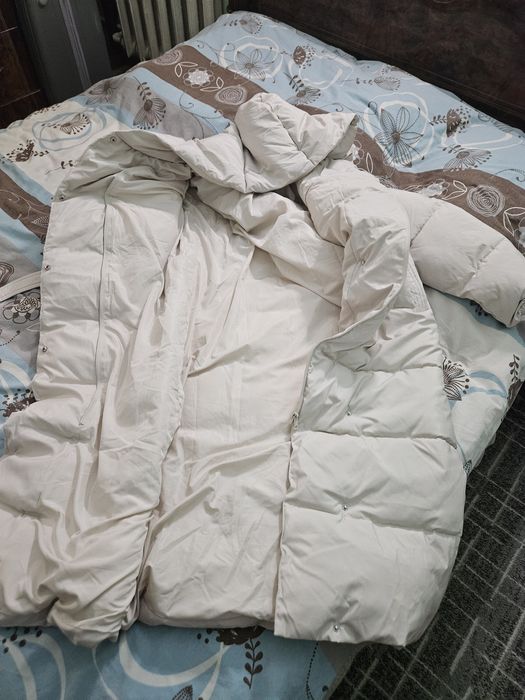 Продам пуховик новый