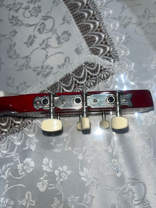 Гитара  кымбат емес