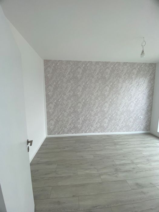 Apartament cu 3 camere+ loc de parcare.