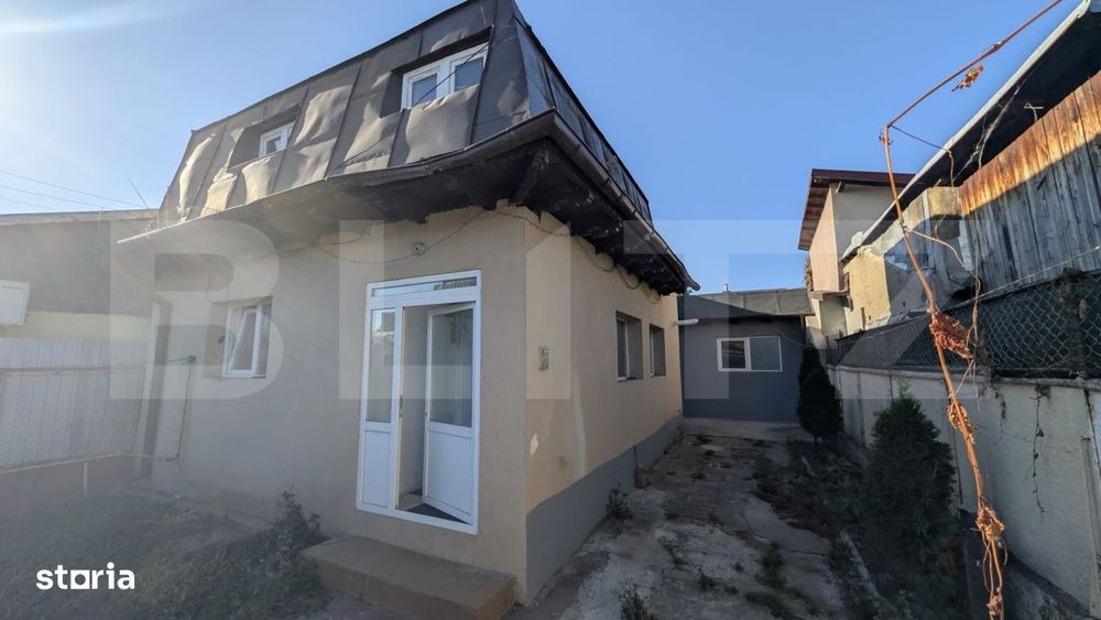 Casa cu 2 camere si mansarda ,plus bucatarie de vara .