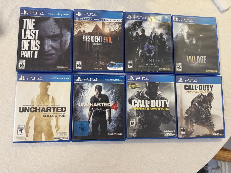 Play Station 4 original 8 jocuri incluse