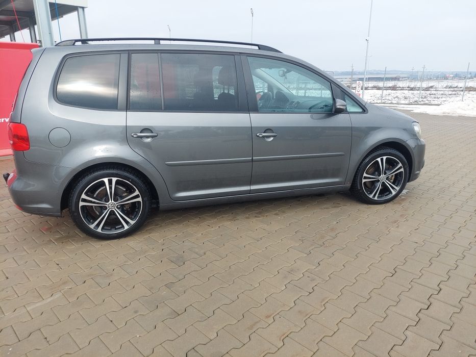 Vând vw touran 2013 model 7locuri
