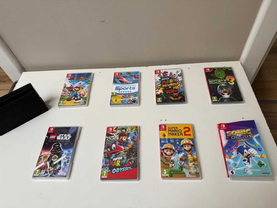 Nintendo Switch Neon Red/Blue + Mario Kart Live Luigi Set + 20 jocuri + accesorii