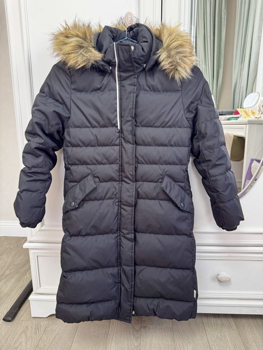 Пуховик Reima в идеальном состоянии легкий, теплый, не промокаемый.
