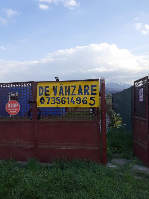 Vând teren în Orașul Brașov  , împrejmuit cu gard