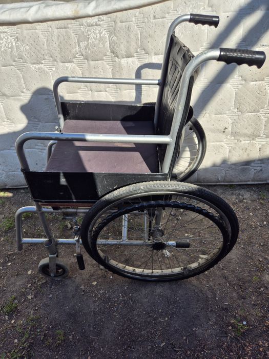 Инвалидная коляска