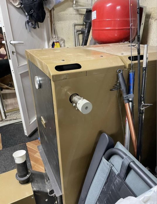 Котел с радиатори на пилети и дърва