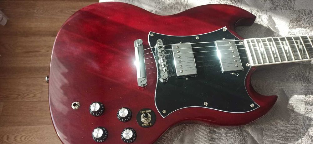 Электрогитара Gibson SG — новая