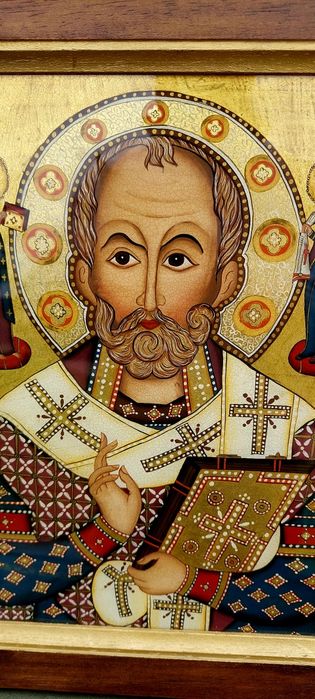 Icoană religioasă pictată pe sticlă.