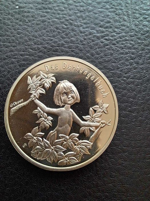 Монета книга за джунглата