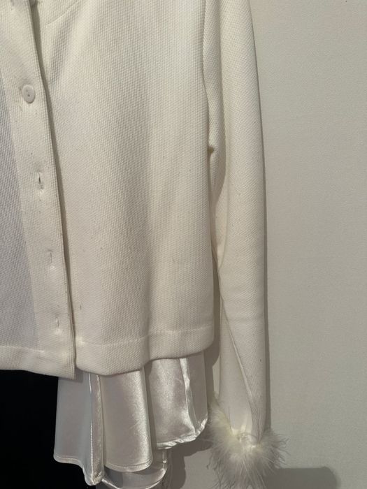 Продам кофту с перьями