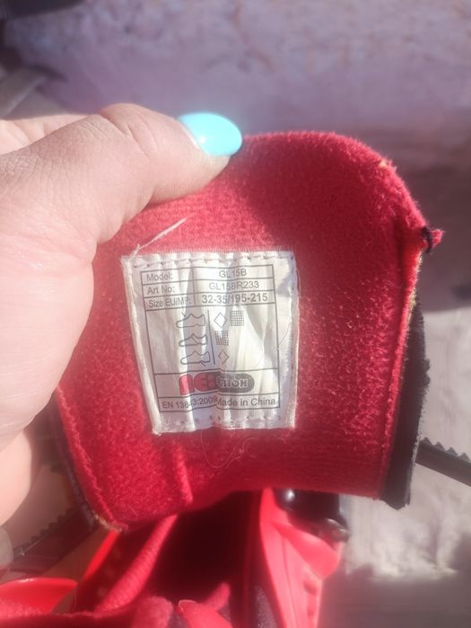 Роликовые коньки