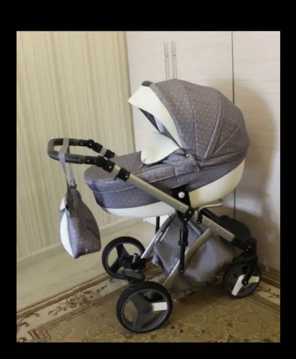 Детская прогулочная коляска