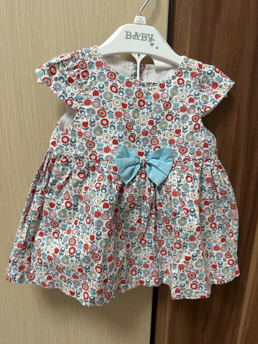 Costum cu botosei