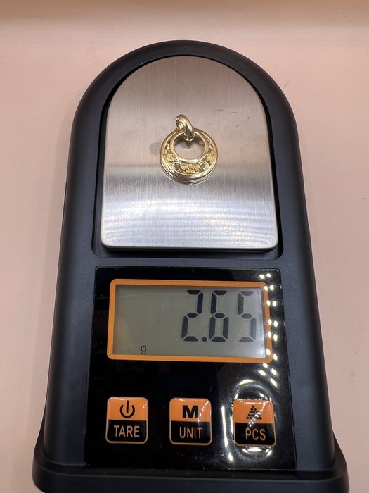 Продам золотой кулон.