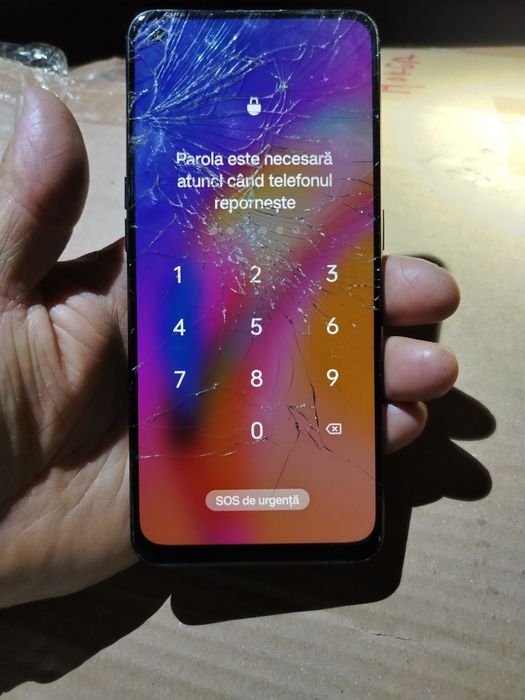Oppo Reno 5 Lite cu sticlal sparta . Touchul  este functional.  Vibrează, se aud sunete. Pentru piese
Are cod pin