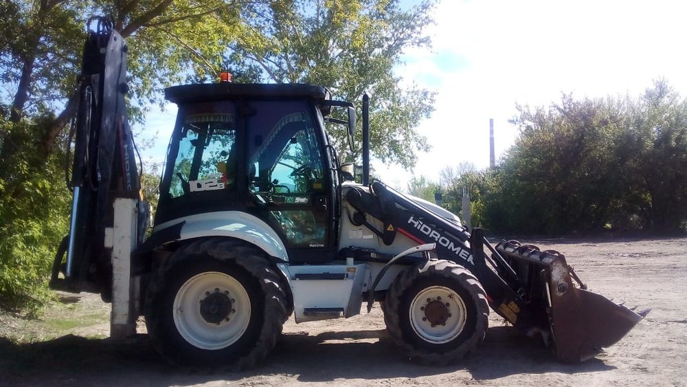 Услуги экскаватора погрузчика