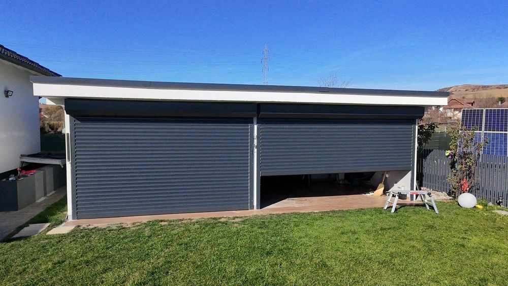 Rulouri exterioare.  Usi de garaj tip rulou.  Rulouri aluminiu.  Usii