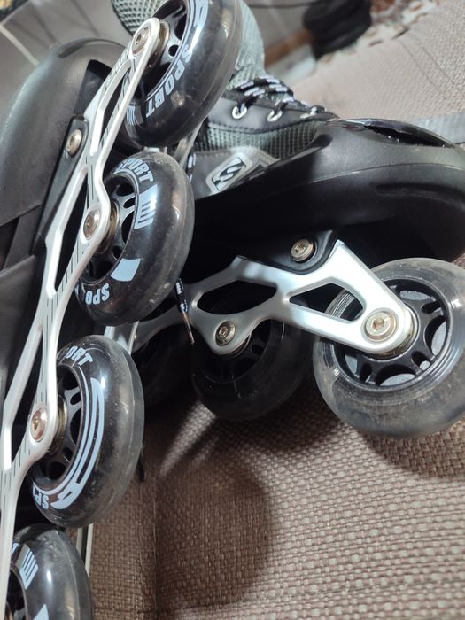 Роликовые коньки