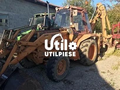 Dezmembrare Buldoexcavator Case 580G 580F 580K 580L 580M + piese