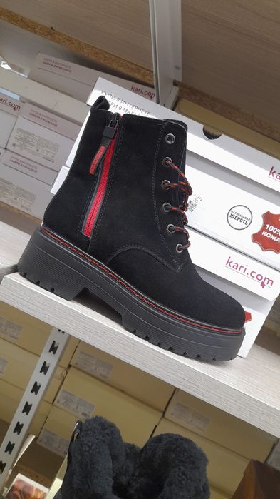 Продам пуховик и сапоги Kari