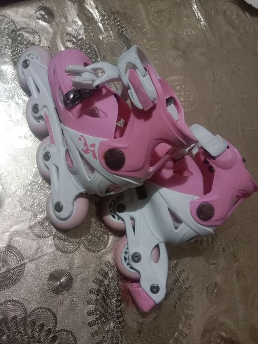 Роликовые коньки