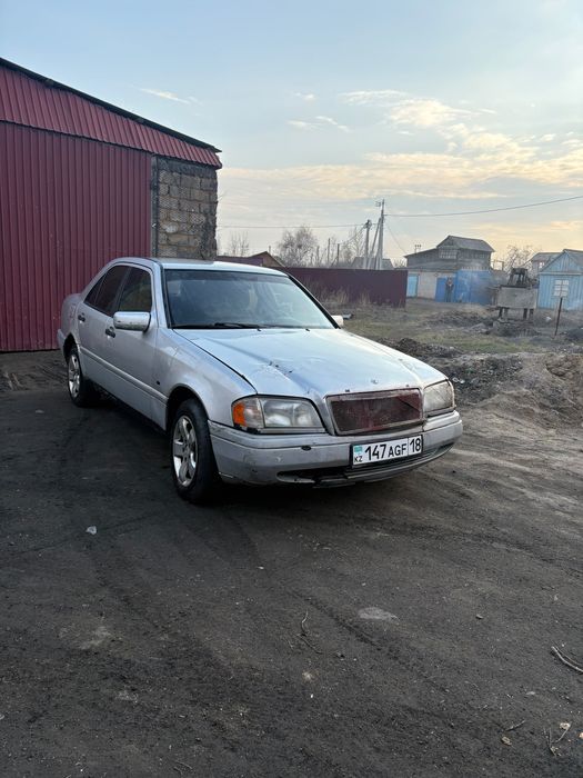 Мерседес C200 w202