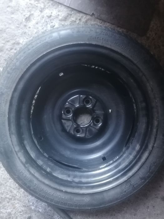 Резервна гума "патерица" за W, AUDI  14' 4/100.+ ключ за нея.