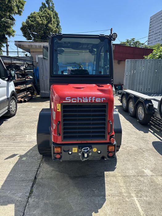 VÂND Încărcător frontal articulat telescopic SCHÄFFER 2630T SLT CAB (2025, doar 74 ore!) + Remorcă M6 Tridem (2025)