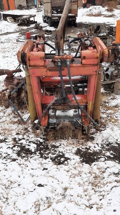 Фронтальный погрузчик т 150, установка