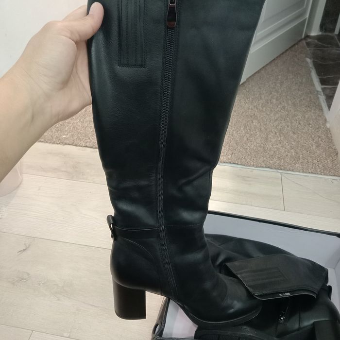 Продам новые сапоги