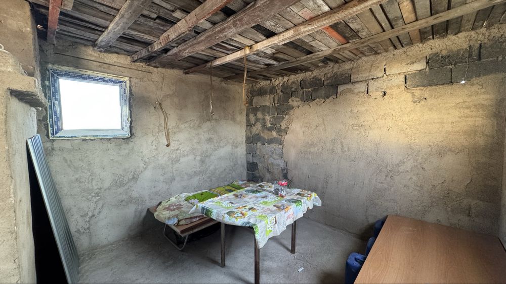 Продам землю с постройкой