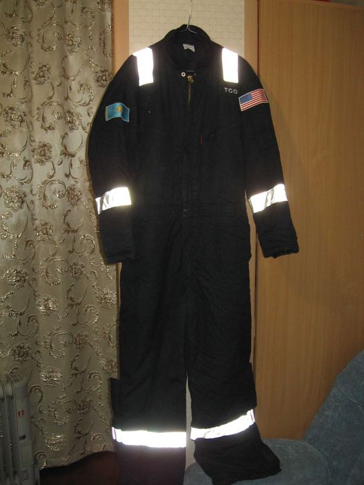 Зимние комбинезоны