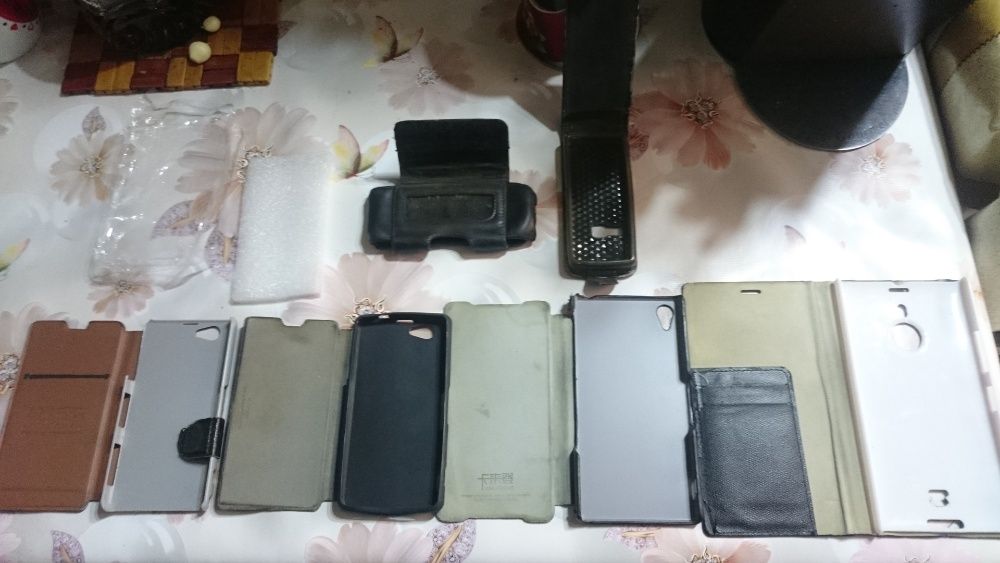 Чехлы-книжка на кнопочные и сенсорные телефоны Nokia,Sony