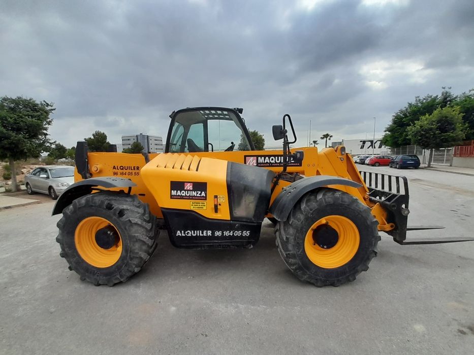 Inchiriez buldoexcavator, inchiriez, miniexcavator, Manitou, incarcato