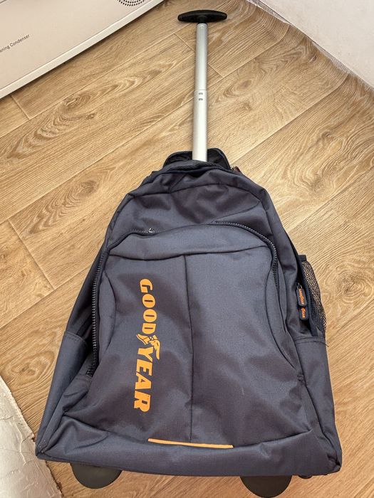 Сак на колелца с телескопична дръжка