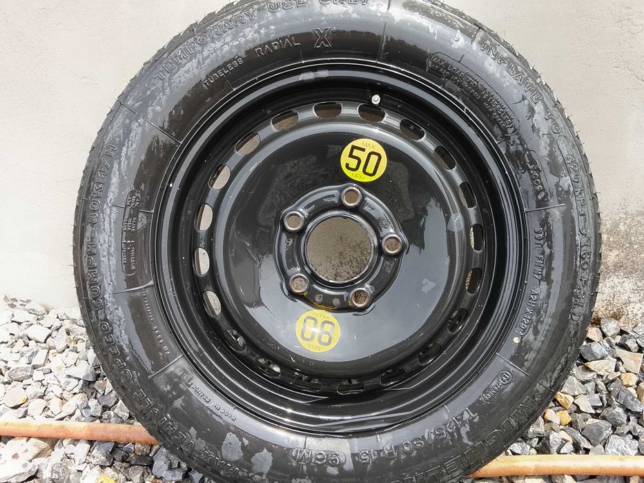 Vind o roata rezerva slim BMW pe 15