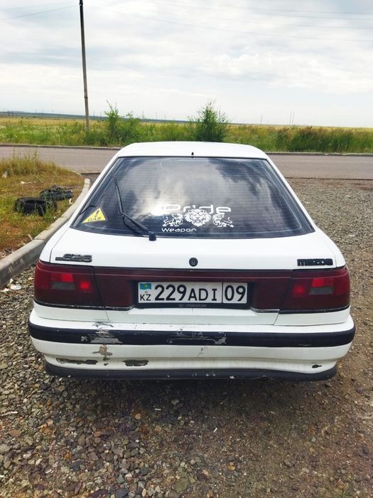 Мазда 626 Газ-Бензин