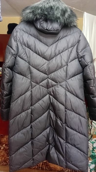 Продам пуховик.8т.