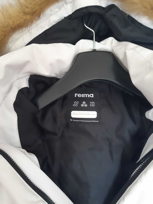 Продам пуховик Reima