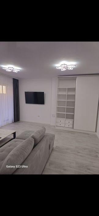 Tunari/Inchiriez Apartament cu grădină 2 camere 60mp  mobilat și utila
