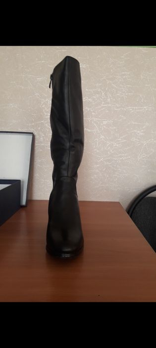 Продам новые зимние сапоги