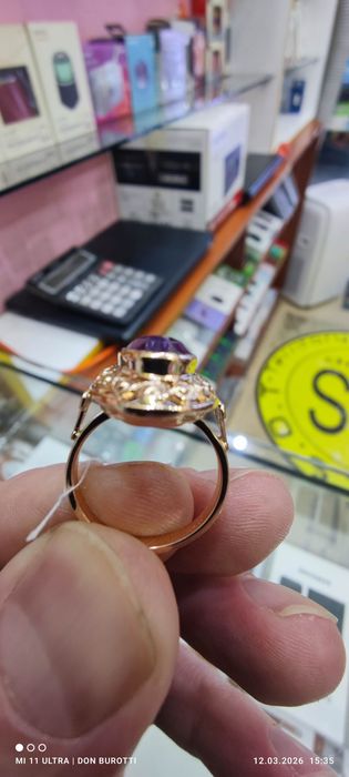 Золотое женское кольцо