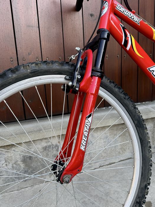 Bicicletă copii MTB Kreativ Dinamik 24", 18 viteze, dublă suspensie – stare bună