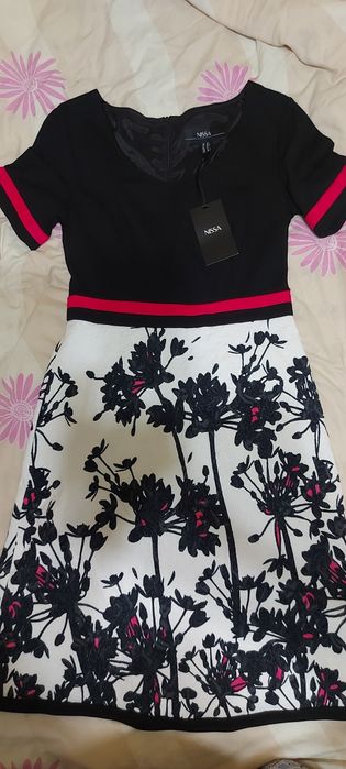 Rochie Nissa NOUA,  Esprit